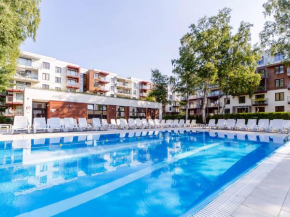 Apartament pomarańczowy z basenem,sauną-blisko morza.